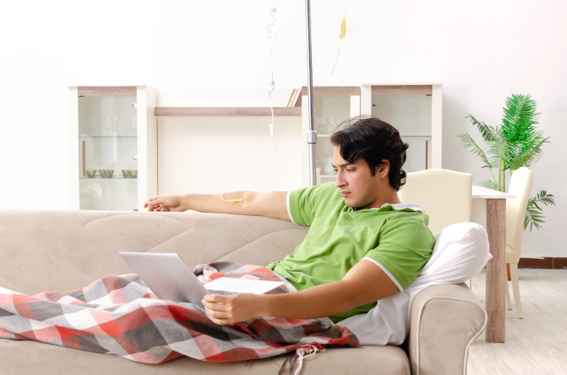 Person rejuvenating with iv for detox