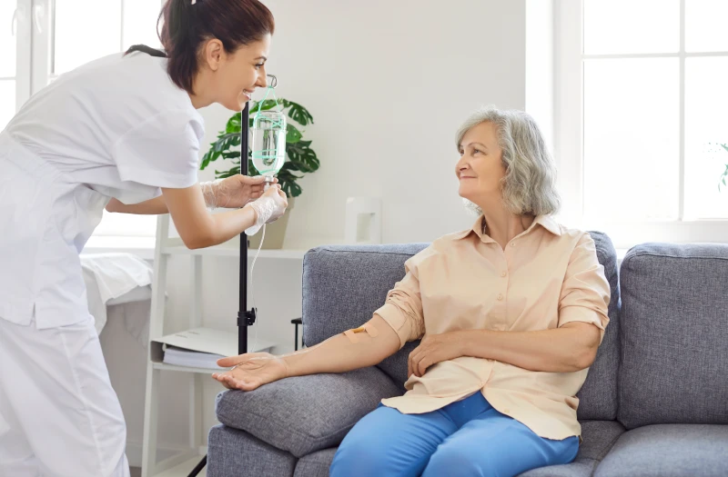 Elderly woman doing iv nad therapy for anti aging benefits